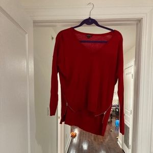 Red V neck sweater with zipper detailing